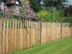 Closeboard fencing with castle top in Reigate